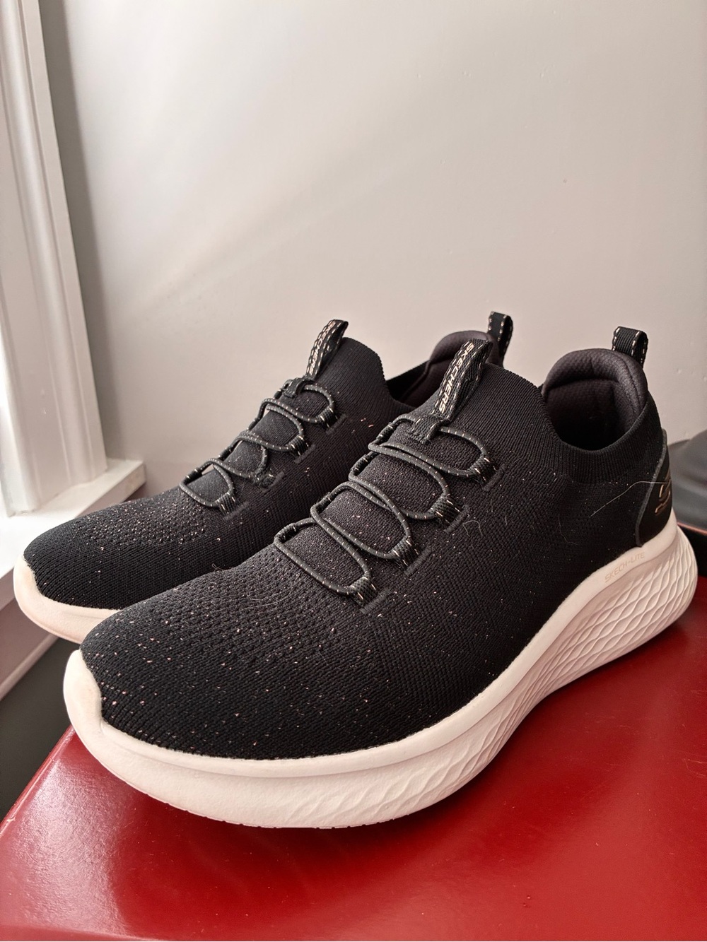 Skechers Black Knit Slip-On Athletic Sneakers with White Sole